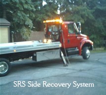 2007 IH4300 with a JERR-DAN 22ft 102" wide Aluminum carrier deck. This truck is equipped with the new SRS10 (Side Recovery System) this allows us to recover cars from ditches with a pivoting 10k winch set in place of the head board without blocking the road.
